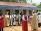 Bishop Nicholas Holtam praying with Archbishop and bishops of ECS